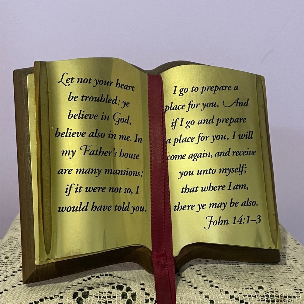 Gold Decorative Bible Book with Red Ribbon decor featuring scripture